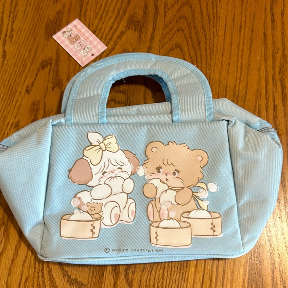 Brand new with tags Mikko Blue Lunch bag. Licensed and insulated
